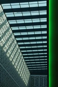 Lines and pattern in architecture with glass and steel. Stock Photos