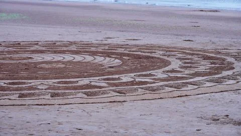 Lines and patterns drawn in the sand Stock Photos