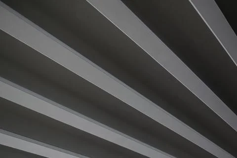 Lines in architecture. Bottom view of the overpass bearing beams. Modern arch Stock Photos