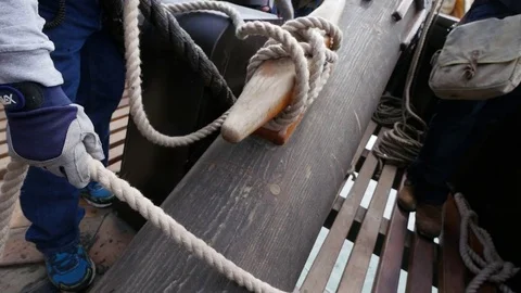 Lines being loosened on a square rigger sailing off the San Diego Coast Video stock 73936727
