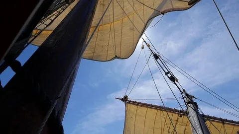 Lines being loosened on a square rigger sailing off the San Diego Coast Video stock 73936932