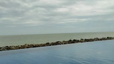 Lines between swimming pool and ocean Stock Footage 269690580