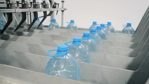 Lines with bottles of water on automatic machine in shop Stock Footage 160714170