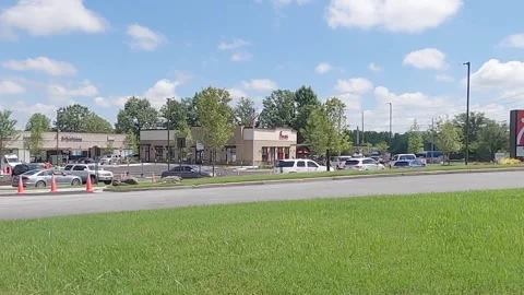 Lines at a Chic fil a restaurant distant long version Stock Footage 288779538