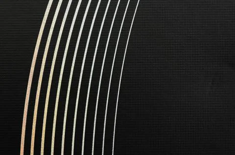 Lines curved on a black background create a pattern with no focus Stock Photos