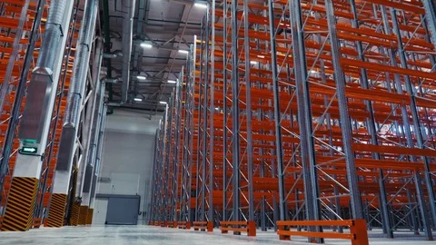Lines of empty racks in new spacious plant warehouse Stock Footage 120652905