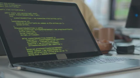 Lines of HTML Code Appearing on Black Laptop Screen Stock Footage 259149326