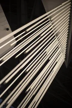 Lines in the interior. Light sources in the dark. Glowing lines. Stock Photos