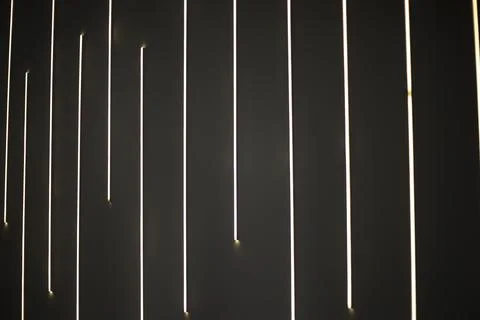 Lines in the interior. Light sources in the dark. Glowing lines. Stock Photos