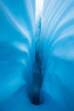 Lines leading down inside a crevasse on a glacier in Alaska. Stock Photos