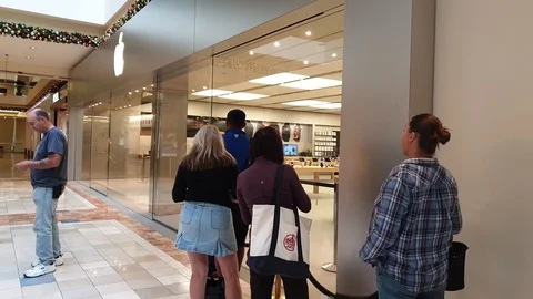 Lines outside Apple Store Stock Footage 98819779