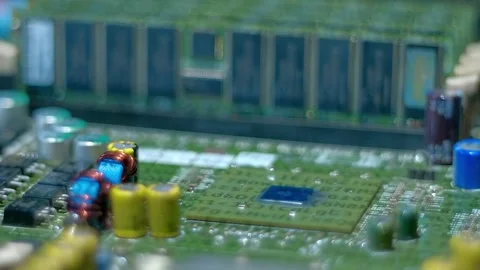 Lines of program code move along processor, memory chips and other components Stock Footage 313228950