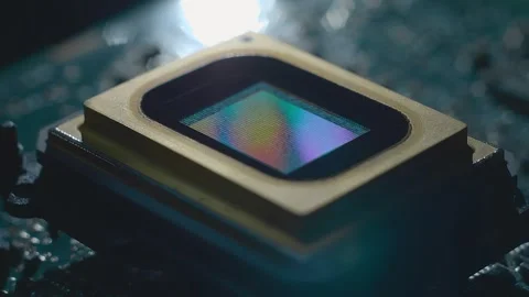 Lines of program code moves on video matrix located on the printed circuit board Stock Footage 313176728