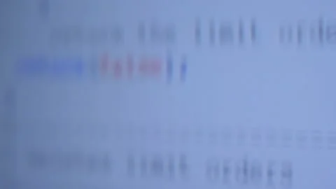 Lines of programmes code run across the white screen Stock Footage 142113940