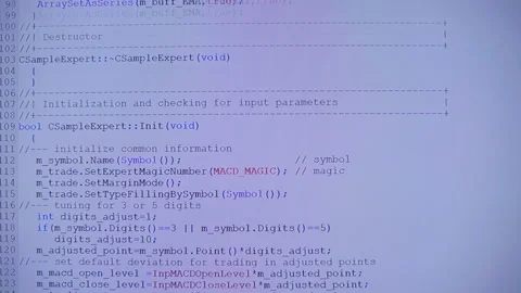 Lines of programmes code run across the white screen Stock Footage 142430366