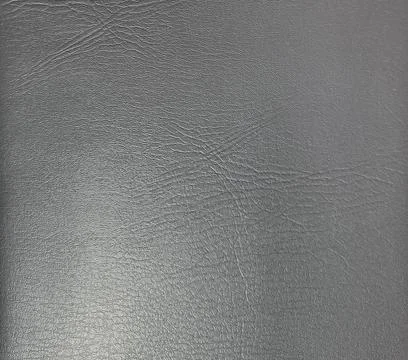 Lines on the surface of black leather. Stock Photos