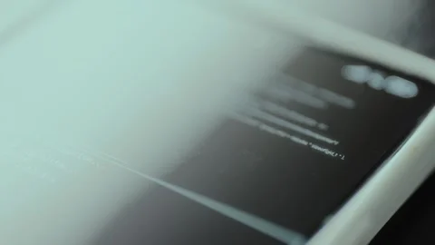 Lines of text providing information on error log on smartphone screen Stock Footage 326044591