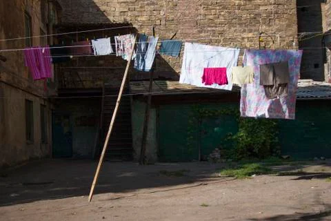 Lingerie drying in the yard Stock Photos