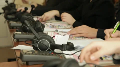 Linguaphone language courses. Students taking a headphones. Stock Footage 12561911