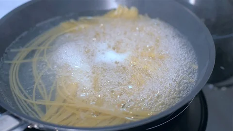 Linguines are cooked in a pan Stock Footage 111669622