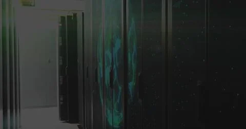 Lining tall black server cabinets along narrow data center corridor, with Stock Photos