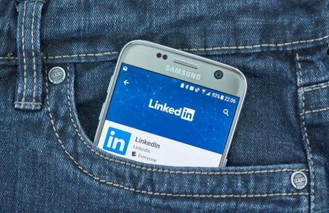 Linkedin app on a cellphone screen Stock Photos