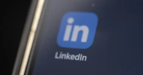 Linkedin app on smartphone’s screen rotating Stock Footage 301256915