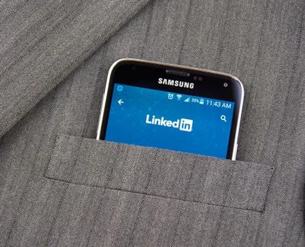 Linkedin application on cell phone. Stock Photos