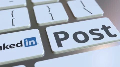 LINKEDIN company logo and Post text on the keys of the computer keyboard Stock Footage 103683364
