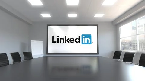 LinkedIn logo on the screen in a meeting room. Editorial 3D rendering Stock Illustration