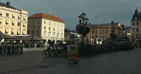LINKÖPING, SWEDEN - AUGUST 4, 2018: People walking and hanging out in Stock Footage 95216573