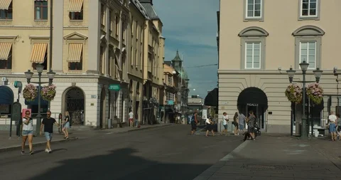 LINKÖPING, SWEDEN - AUGUST 4, 2018: People crossing the street and hanging out Stock Footage 95217980
