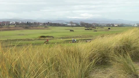 Links golf course snow capped mountains in background Stock Footage 47093131
