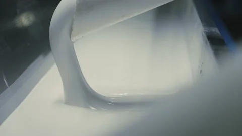 Linoleum technology production. Application of PVC-layer on the linoleum. 動画素材 130924918