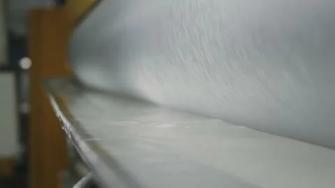 Linoleum technology production. Application of PVC-layer on the linoleum. 動画素材 130924991