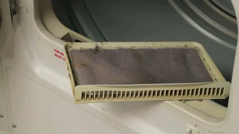 Lint Trap and Dryer in Laundry Room Stock Footage 71365264