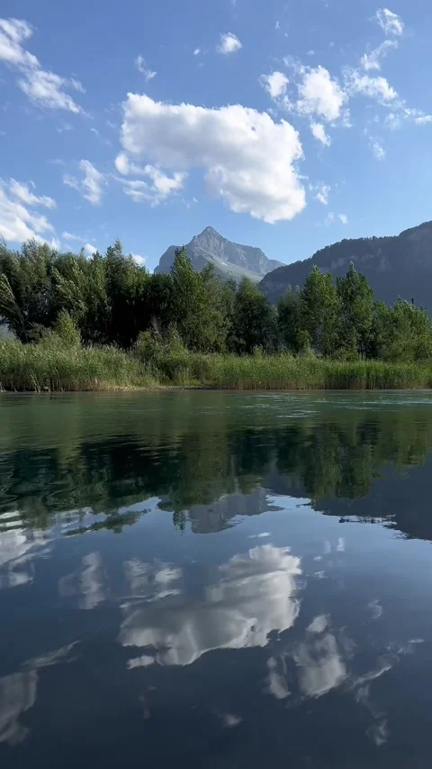 Linth river Glarus Alps nature view outdoor water stream reflection, vertical Видео 331346231
