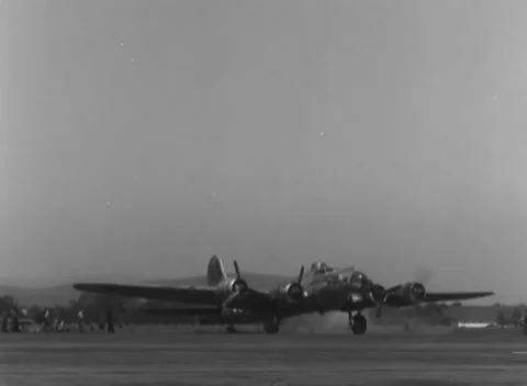 LINZ, AUSTRIA - 1945: Spinning propellers - a B-17 bomber runs the runway Stock Footage 344600144
