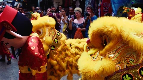 Lion dancing performance by chinese people at Chinatown Stock Footage 105294346