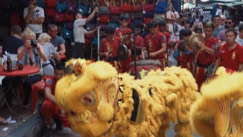 Lion dancing performance by chinese people at Chinatown Stock Footage 105722665
