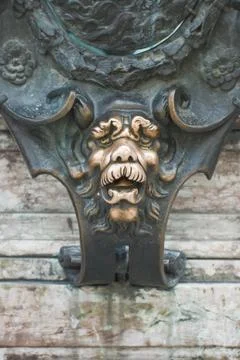 Lion face on a statue Stock Photos