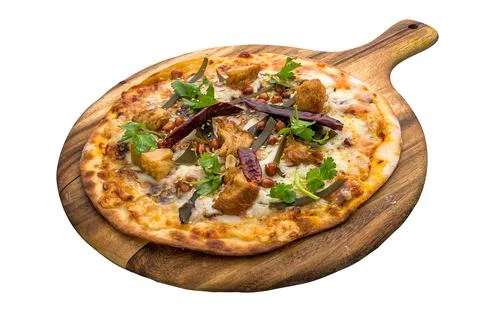 Lion Mane Mala Pizza isolated on wooden cutting board on plain white backgrou Stock Photos
