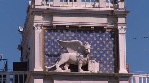 The lion of Static shot of St Marks Lion on the Astrological Clock Tower, Venice Stock Footage 74550949