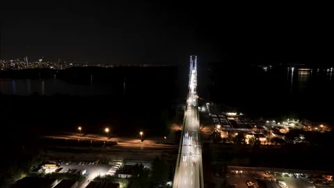 Lions Gate Bridge aerial, hyperlapse, night, car light trails, traffic Stock Footage 245954704