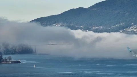 Lions Gate Bridge With Dense Fog And Clouds In Vancouver, Canada - Drone Shot Stock Footage 331753167
