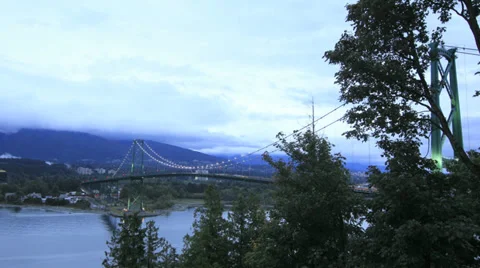 Lion's Gate Bridge with Moving Clouds and Traffic Time Lapse Stock Footage 28499069
