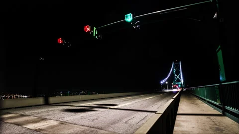 Lions Gate Bridge time lapse, night, car light trails, traffic, Vancouver, BC Stock Footage 209498339