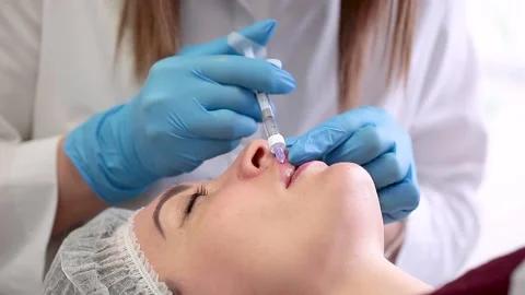 Lip augmentation. Stock Footage 143589586