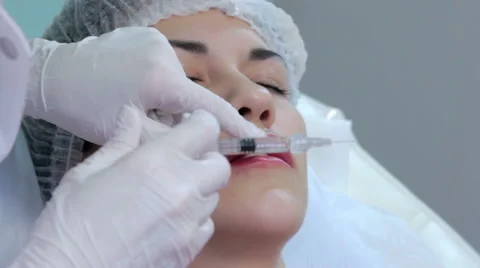 Lip injection plastic surgery  Stock Footage 58933828