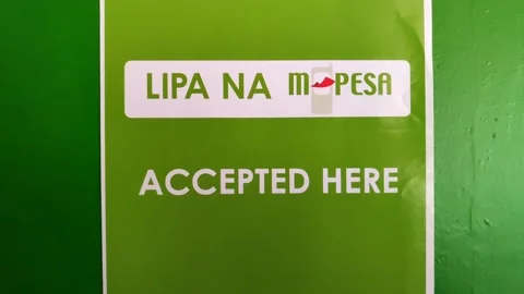 Lipa na M-pesa Sign Poster on a Door in ... | Stock Video | Pond5